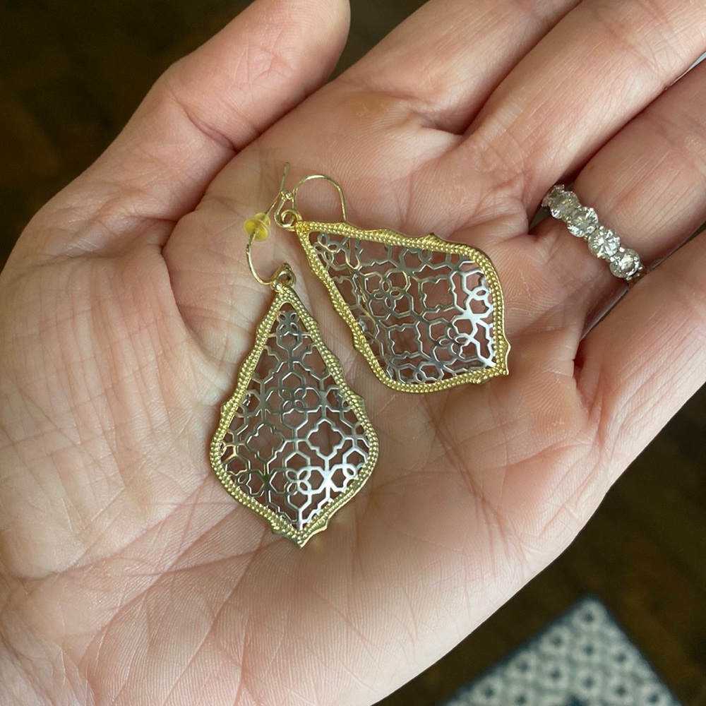 Kendra Scott gold and silver earrings